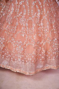 This peach pink lehenga choli blends soft elegance with heavy embroidery Perfect for creating a dreamy festive look - Product Image 6