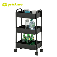 Chariot utilitaire en métal à trois niveaux avec roulettes pour le rangement et l'organisation de la cuisine, design minimaliste, forme rectangulaire, type sur pied