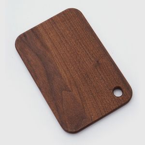 Tabla de cortar de madera maciza sostenible con acabado natural y estructura duradera, perfecta para cortar carne, frutas y verduras. - Product Image 1