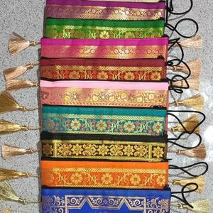 Pochettes en soie brodée indienne faites à la main, confectionnées en soie chatoyante et ornées d'un travail complexe de fil doré Zari. - Product Image 1