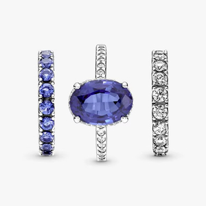 Ensemble de bagues de fiançailles de luxe 3 pièces en saphir bleu ovale créé en laboratoire pour femmes |   Bague de mariage empilable en or 18 carats avec accent de diamant rhodié - Product Image 1