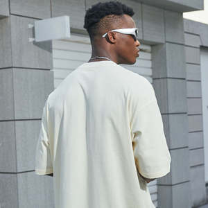 เสื้อยืดคอตตอนทรงโอเวอร์ไซส์คุณภาพสูง แบบเรียบ สีพื้น พิมพ์ลายโลโก้ด้านหน้า ระบายอากาศได้ดี สไตล์สตรีทแวร์สำหรับผู้ชาย สามารถสั่งทำได้ - Product Image 3