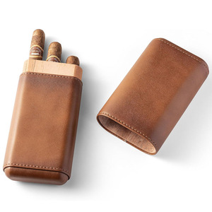Estuche de puros de cuero premium con cortador integrado, estuche de transporte con cortador integrado y material de cuero genuino para mayor elegancia. - Product Image 1