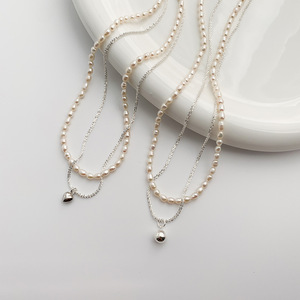 Collier luxueux en perles d'eau douce naturelles avec pendentif en agate pêche, ambiance lumineuse et chaîne de clavicule, nouveau design élégant - Product Image 2