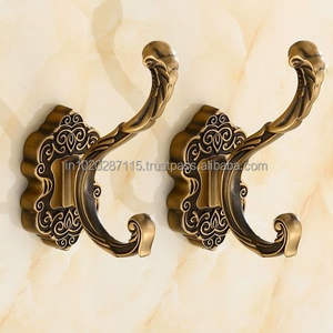 Wall mounted brass wall <b>hooks</b> provide elegant solution <b>for</b> organizing coats <b>towels</b> accessories efficiently in home spaces - Product Image 1