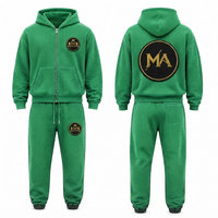 Ensemble de survêtement vert à capuche 100% coton avec fermeture éclair intégrale, poche avant et patch brodé appliqué 480 g/m²