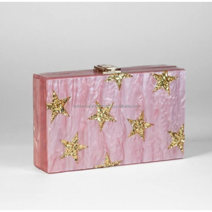 Elegante bolso de mano de resina rosa con diseño de incrustaciones de estrella dorada y acabado jaspeado para mujer, ocasiones de noche y fiesta - Product Image 1