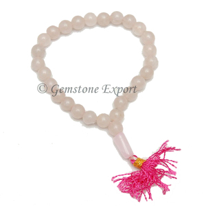สร้อยข้อมือลูกบอลคริสตัลโรสควอตซ์ขัดเงา-ลายดอกไม้แกะสลักด้วยเลเซอร์ ของขวัญหินแห่งความรักสำหรับธุรกิจ คริสต์มาส ปีใหม่ และของที่ระลึก - Product Image 1