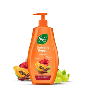 Champú reparador de daños y anticaída enriquecido con shikakai y hibisco, fórmula suave, pH equilibrado, sin parabenos, para un cabello nutrido. - Product Image 1