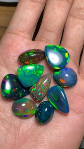 โอปอลเอธิโอเปียธรรมชาติทรงหลังเบี้ยสีดำ หลายสี หลายขนาด สำหรับทำเครื่องประดับ - Product Image 1