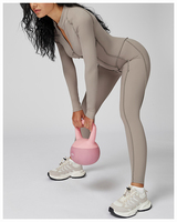 Combinaison pour femme à col montant, style tendance, extensible, pour l'entraînement, avec faible MOQ
