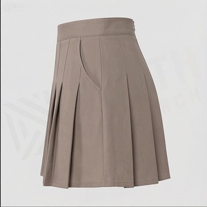 Jupe plissée mini pour femme, couleur unie, taille élastique, respirante, en polyester, à porter en toutes saisons - Product Image 3