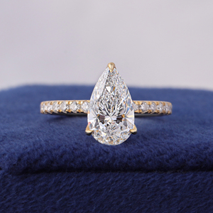 Bague de fiançailles en or 14 carats certifiée IGI, en forme de poire, 2 carats, avec halo caché et sertissage pavé, idéale pour les occasions festives - Product Image 1
