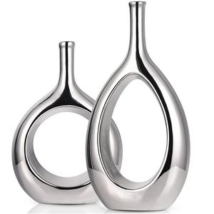 Macetero de lujo con forma de anillo, moderno y abstracto, en gris bronce granulado, para estantería y mesa de centro - Product Image 3