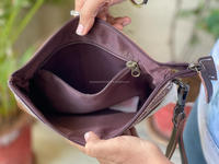 Pochette en cuir taillée à la main sculpture en cuir véritable pochette portefeuille en cuir occidental portefeuille unique et élégant pour les femmes