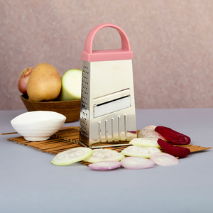 Stainless steel 4 in 1 slicer and grater with durable plastic handle <b>multifunctional</b> kitchen tool for efficient food preparation - Product Image 1