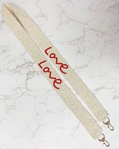 Lanière perlée crème avec inscription « Love » rouge et mousquetons métalliques - Product Image 1