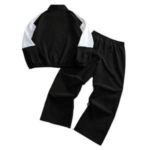 ชุดวอร์มไนลอนผู้ชายสีดำขาวกันน้ำแบบกำหนดเอง พร้อมปักโลโก้ตามสั่ง ผู้ผลิตเสื้อแจ็คเก็ตกันลมและกางเกง - Product Image 5