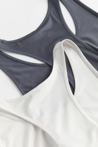 เสื้อกล้ามกีฬาผู้หญิงแบบสั้น ระบายอากาศ แห้งเร็ว เป็นมิตรกับสิ่งแวดล้อม เหมาะสำหรับโยคะ มีโลโก้ด้านหน้า ผลิตจากผ้าสแปนเด็กซ์และผ้าฝ้าย - Product Image 6