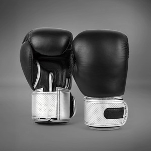 Guantes de Boxeo HOMIZON ENTERPRISES de Alta Calidad OEM en Negro y Plata, Material MMA, Cierre Ajustable con Gancho y Bucle, Protección - Product Image 1