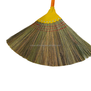 Grass Broom with Yellow Head and Wooden Handle for Floor Cleaning Durable Home Use - Product Image 1