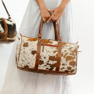 กระเป๋าเดินทางหนังวัววินเทจสำหรับผู้ชายและผู้หญิง - Product Image 2