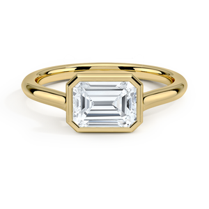 Classic Solitaire <b>Ring</b> with Elegant Bezel Setting in Yellow Gold - Product Image 1