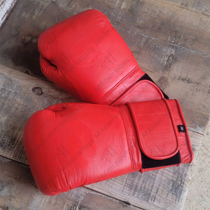 OEM Pro เกรดทนทานต่อสู้การฝึกอบรมถุงมือมวยออกแบบโลโก้ที่กําหนดเองพรีเมี่ยมหนังสังเคราะห์ปากีสถานทําถุงมือฝึกซ้อม - Product Image 3