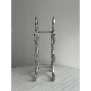 En Oferta: Botellero Metálico Minimalista con Diseño Redondo para Almacenamiento en el Hogar o Bar, Construcción Duradera de Acero Inoxidable - Product Image 3