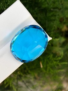พลอยบลูโทแพซธรรมชาติทรงรี รับรองโดย IGI  หินหลวมสีอ่อนจาก Zubeda Gems Rajasthan สำหรับทำเครื่องประดับ ขายส่ง - Product Image 4
