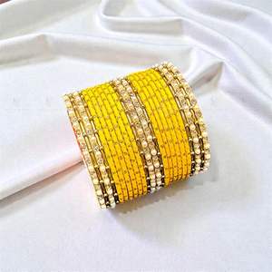 ชุดกำไลข้อมือไหมสีชมพูและสีน้ำเงินเข้ม งานฝีมือสวยงาม ประดับด้วยงานกระจกประณีตและลูกปัดทองคำ ดีไซน์แบบดั้งเดิม - Product Image 1