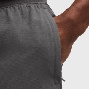 กางเกงวิ่งขาสั้นผู้ชายสำหรับฤดูร้อน ผ้าแห้งเร็ว ระบายอากาศดี สวมใส่สบาย ดีไซน์ผ่าด้านหน้า เป็นมิตรต่อสิ่งแวดล้อม ผลิตจากผ้าแคนวาส โพลีเอสเตอร์/คอตตอน - Product Image 5