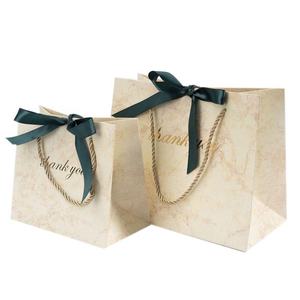 Custom Printed Logo Jewelry Gift Bags with Ribbon Handle Luxury <b>Paper</b> <b>Packaging</b> Bags for Shipping & Boutique Jewelry Boxit.pk - Product Image 1