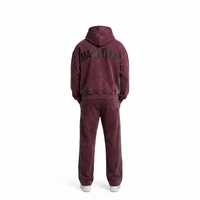 Ensemble de survêtement deux pièces en coton 100% uni, comprenant un sweat à capuche oversize zippé et un pantalon de survêtement large, effet délavé personnalisé