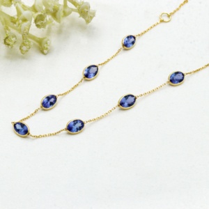 Bracelet en or jaune massif 18 carats avec tanzanite ovale naturelle sertie clos, collection Memoria Jewels, vente en gros - Product Image 3