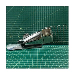 S124-A 1-1/4" <b>Binder</b> and <b>Folder</b> Industrial Sewing Machine Parts Made in Taiwan for Apparel Machines - Product Image 1