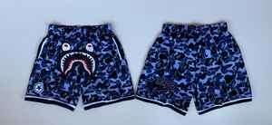 ชุดกีฬาสตรีทแวร์ผ้าโพลีเอสเตอร์ 100% แบบเรียบง่าย กางเกงขาสั้นบาสเก็ตบอลตาข่ายสั่งทำพิเศษสำหรับผู้ชาย - Product Image 3