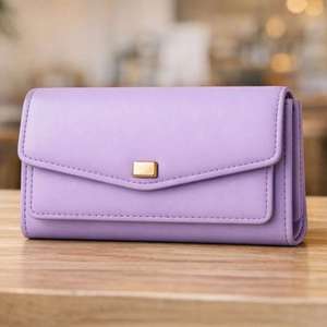 Esta cartera larga para mujer, delgada y minimalista, está diseñada para una organización eficiente con múltiples compartimentos. - Product Image 1