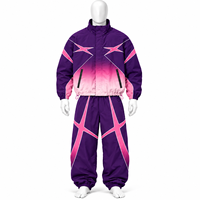 Ensemble survêtement jogging deux pièces en polyester avec veste coupe-vent zippée en nylon et pantalon, personnalisable avec logo, modèle 2026, en vente