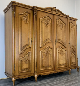 Antique dark wood wardrobe with ornate scroll accents and bottom storage drawers, available at wholesale prices. - Product Image 4