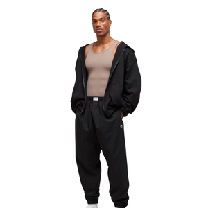 Pantalon de survêtement noir oversize pour homme, coupe ample, taille élastique, idéal pour la gym et l'entraînement - Product Image 4