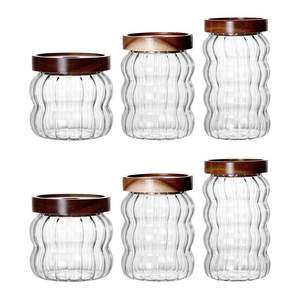 Frasco de vidrio compacto con tapa de madera, tamaño pequeño, perfecto para almacenar especias, hierbas, té, café y artículos esenciales de cocina. - Product Image 2