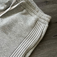 Pantalon de jogging personnalisé avec logo brodé, design rayé décontracté, coupe évasée et ample, en coton, style baggy