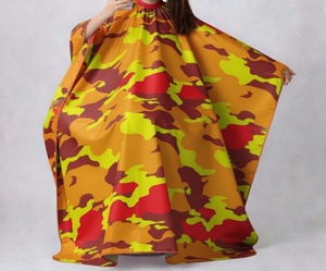 เสื้อคลุมตัดผมกันน้ำลายพรางสีเหลือง - Product Image 1