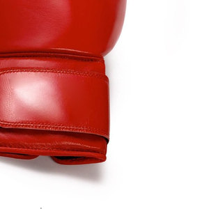 ราคาขายส่ง ถุงมือชกมวยระบายอากาศได้ดี สำหรับออกกำลังกายและฝึกซ้อม พร้อมที่รัดข้อมือ ถุงมือชกมวย PU สำหรับขายออนไลน์ - Product Image 5