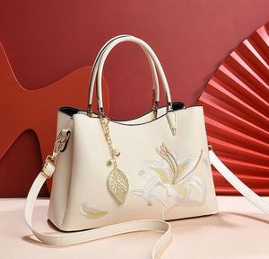 Cream Embroidered Lily Handbag with Leaf Charm and <b>Adjustable</b> Strap Fashionable jewelry clutch bag luxury faction bag - Product Image 2
