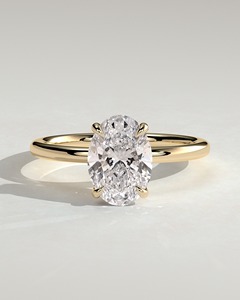 แหวนเพชรทรงรี 2 กะรัต ทองคำแท้ 14K เพชรเลี้ยงในห้องปฏิบัติการ คุณภาพ E VVS2 ตัวเรือนแบบหนามเตย แหวนหมั้นสุดหรู ปี 2026 - Product Image 1