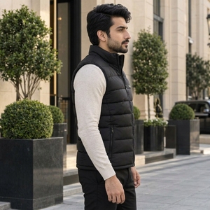 Chaleco de plumón para hombre con aislamiento ligero, protección térmica, tejido exterior duradero, ajuste cómodo y diseño sin mangas. - Product Image 3