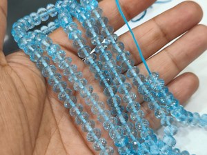 Cuentas facetadas de topacio azul cielo natural en forma de rondel, vendidas por hebra de 8 pulgadas de largo - Product Image 2