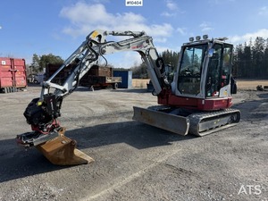 Mini-excavatrice Takeuchi TB257FR robuste, conçue pour les travaux de construction difficiles, avec une hydraulique puissante et un contrôle fluide. - Product Image 3